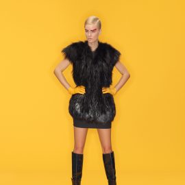 Black argenté fox vest with removable knit collar and sleeves.